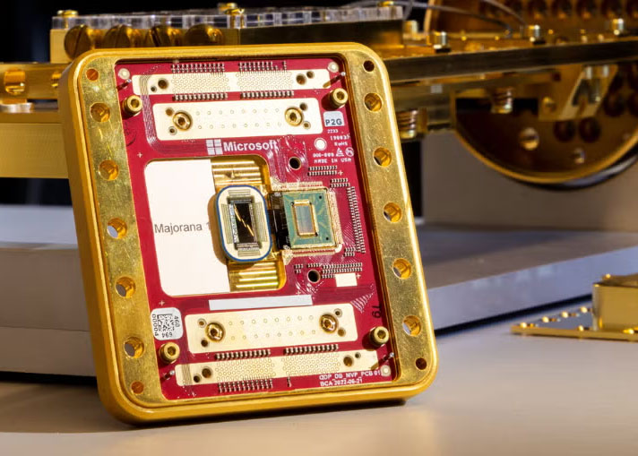 A palm-sized computer chip on display on a lab bench