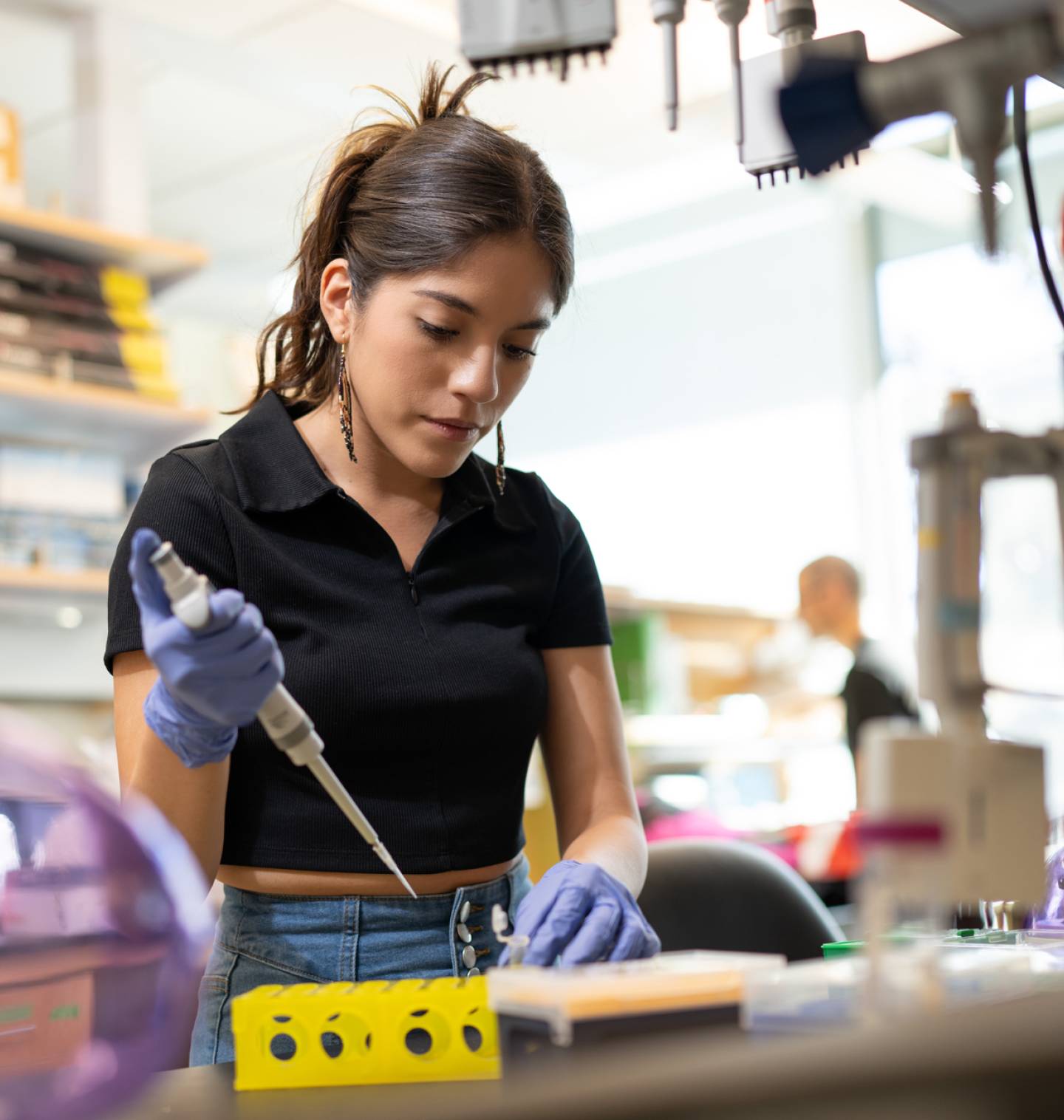Student working in lab on campus.